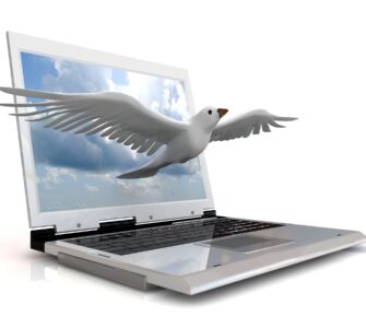 bird flying out of laptop
